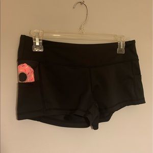 Feed Me Fight Me donut in pocket shorts